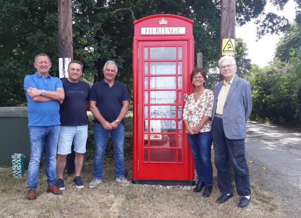 Renovated red phone box Bradfield Combust Team